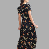Flora – Gėlėta juoda maxi suknelė