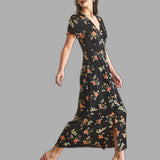 Flora – Gėlėta juoda maxi suknelė