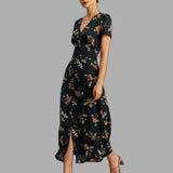 Flora – Gėlėta juoda maxi suknelė